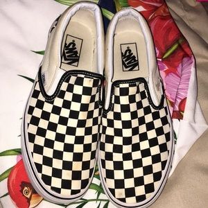 checkerboard vans. slightly worn